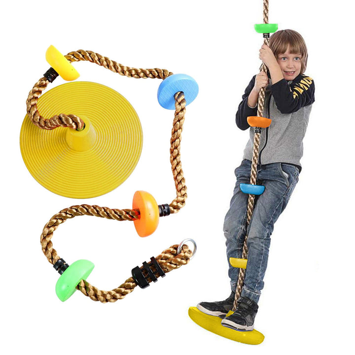 Child playing with a rope ladder toy on a white background.