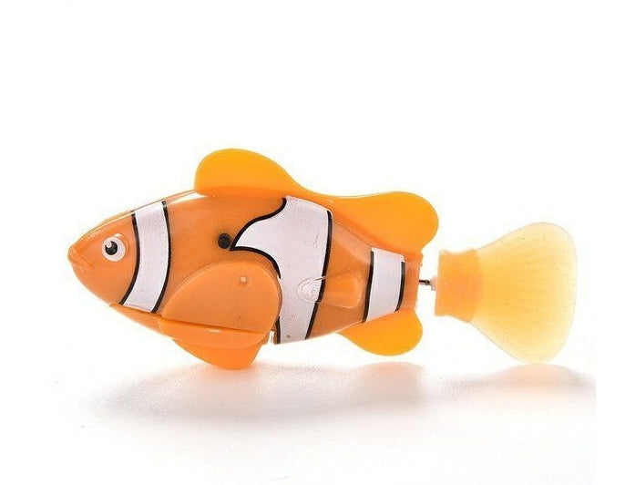 Toy fish with orange and black stripes on a white background.