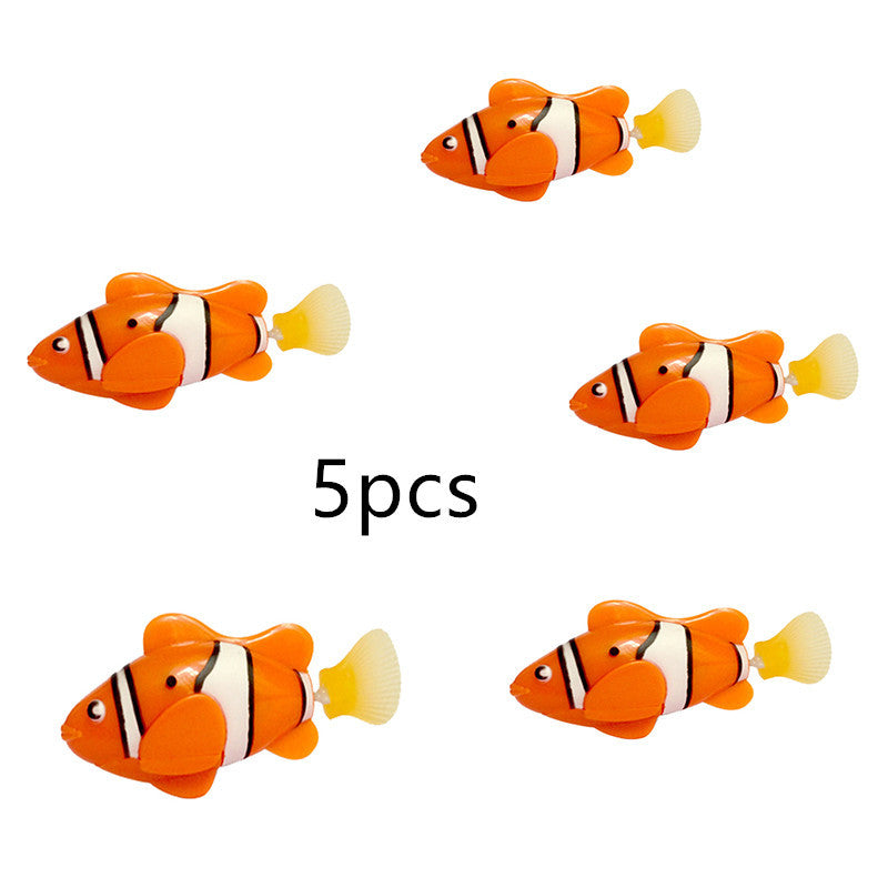 Five clownfish toys on a white background.