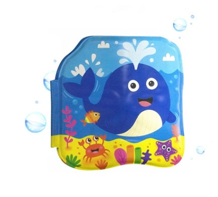 Children's inflatable pool float with a whale design on a white background.