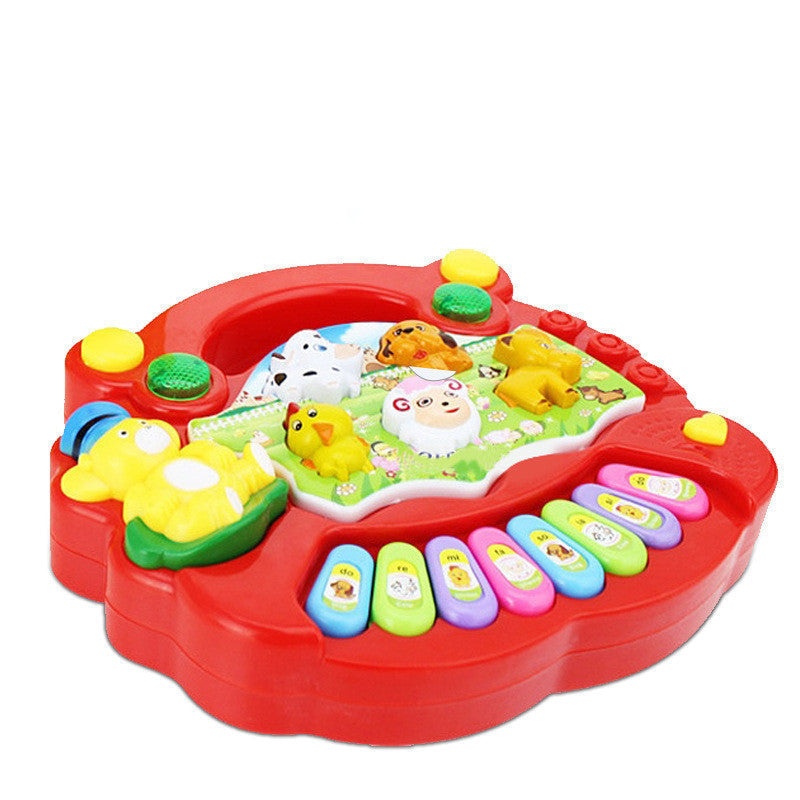 Colorful toy piano with animal illustrations on a white background.