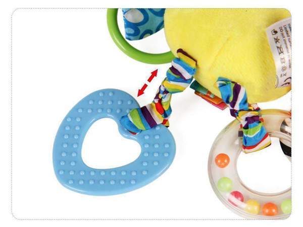 Colorful baby toy with heart-shaped teether and hanging elements on a white background.