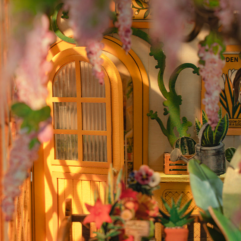 Decorative interior with a wooden cabinet, plants, and floral arrangements.