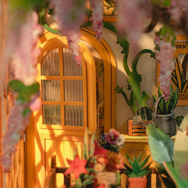 Decorative interior with a wooden cabinet, plants, and floral arrangements.