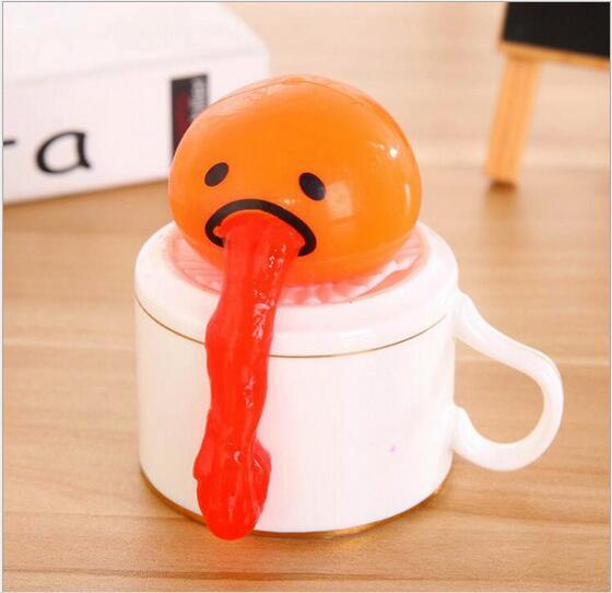 Funny Vomiting Egg Yolk Toy – Stress Relief Squishy Prank Gift