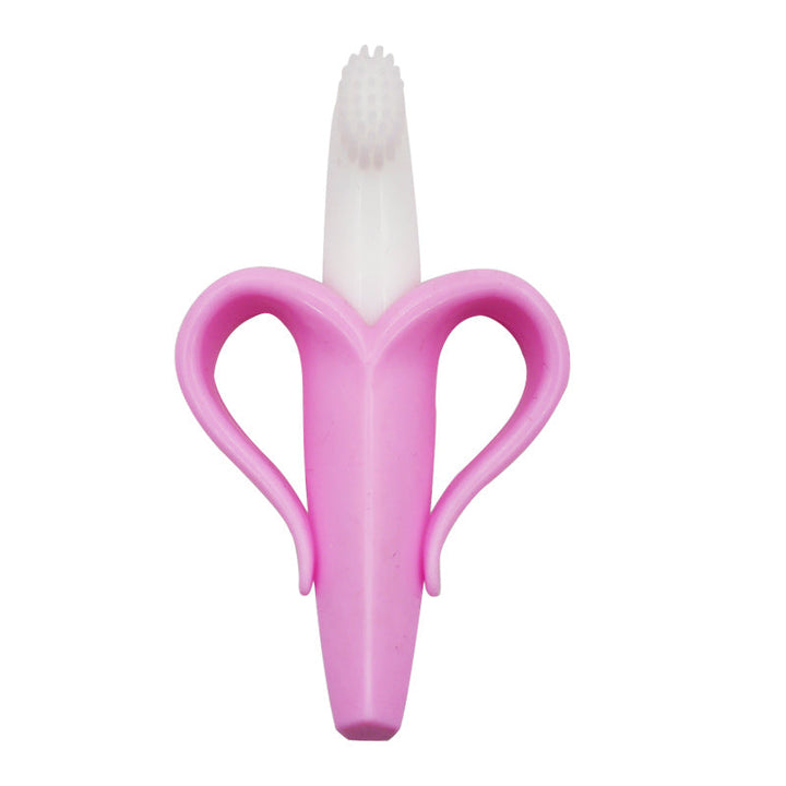 Pink baby toothbrush with white bristles on a white background.