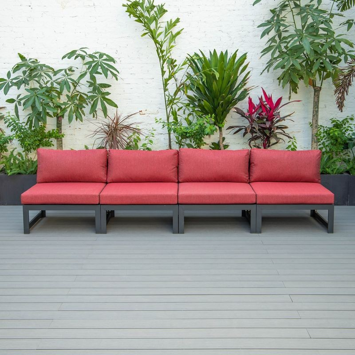 LeisureMod Chelsea 4-Piece Middle Patio Chairs Black Aluminum with Cushions Red in a Row.