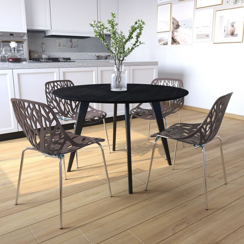 Black round table with four brown chairs in a kitchen setting.