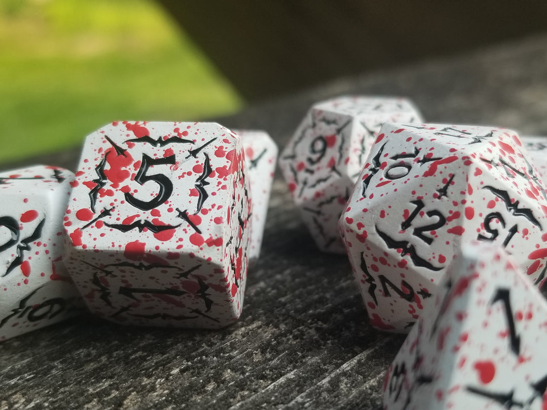 Battle Hardened Dice: White metal dice w/Black numbering and Red Splatter 7- Dice Set Rpg