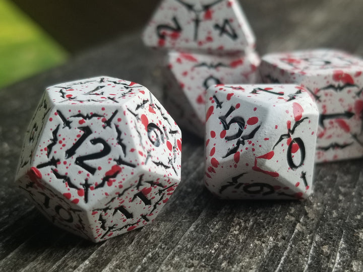 Battle Hardened Dice: White metal dice w/Black numbering and Red Splatter 7- Dice Set Rpg