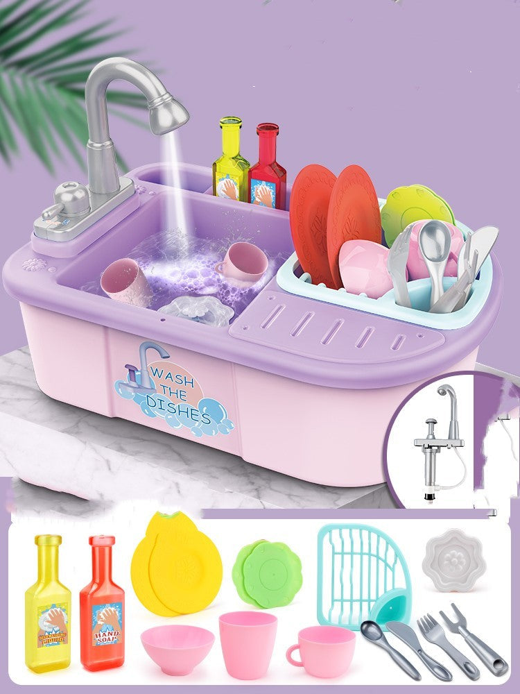 Children's toy kitchen sink set with utensils and accessories on a purple background.