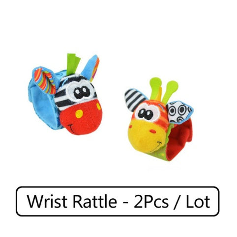 Two colorful wrist rattles on a white background with text indicating quantity.