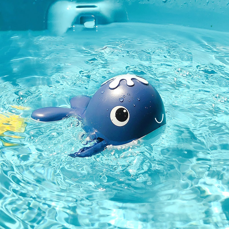 Blue octopus toy floating in clear blue water.