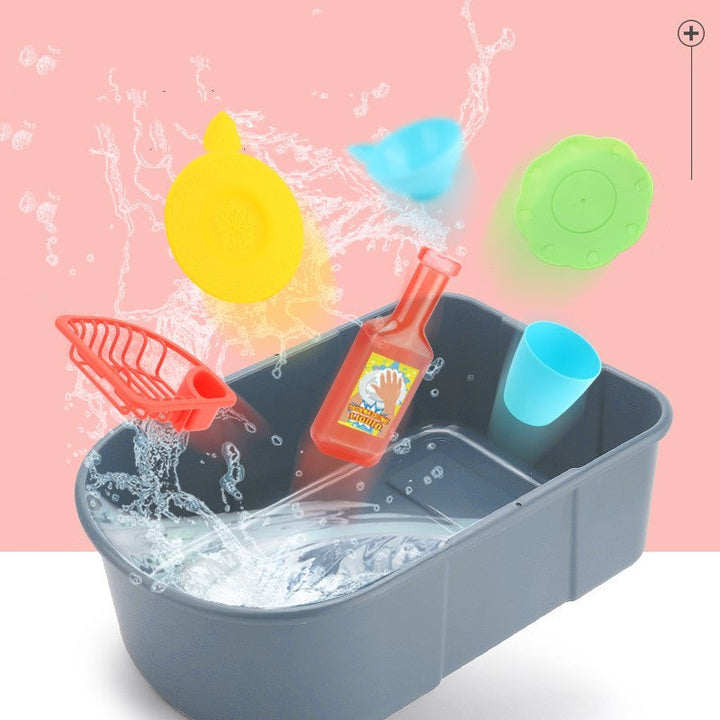 Toy bathtub set with colorful tools on a pink background.
