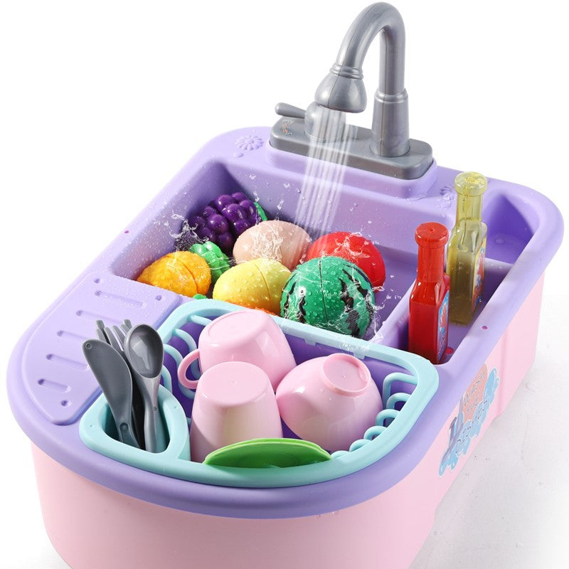 Children's toy kitchen sink with colorful play food and utensils.