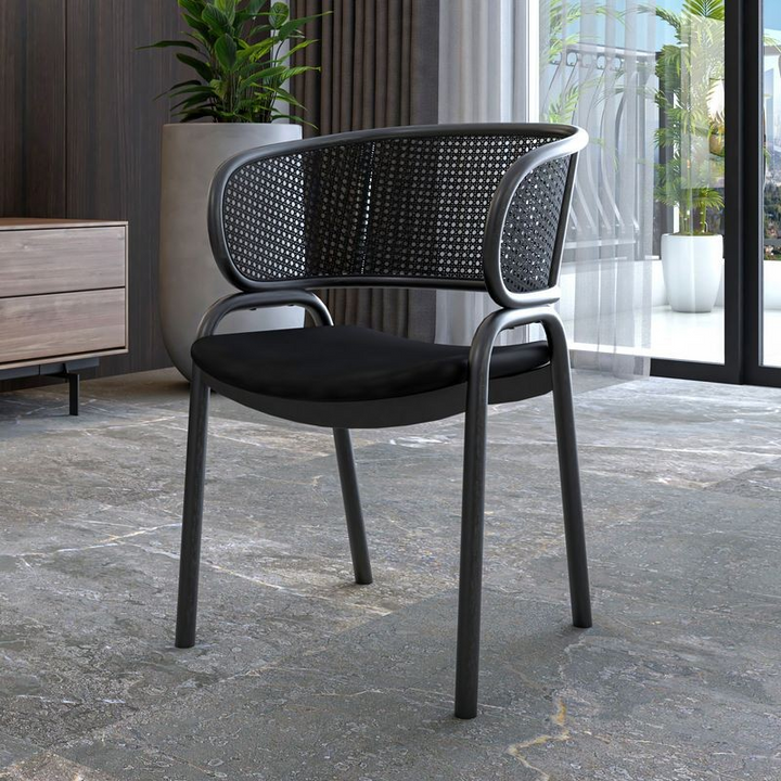 LeisureMod Ervilla Dining Armchair in Black Steel Frame with Black Wicker Back and Black Seat with Background.
