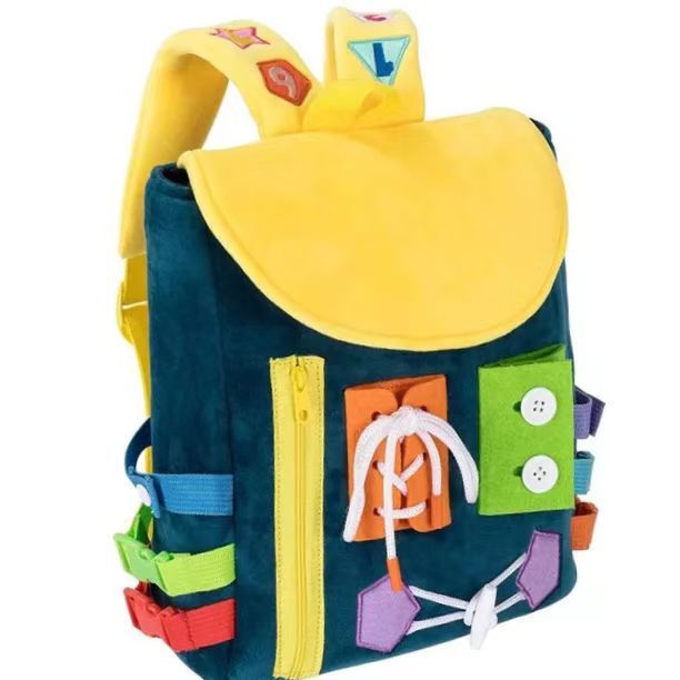 Colorful children's backpack with various compartments on a white background.