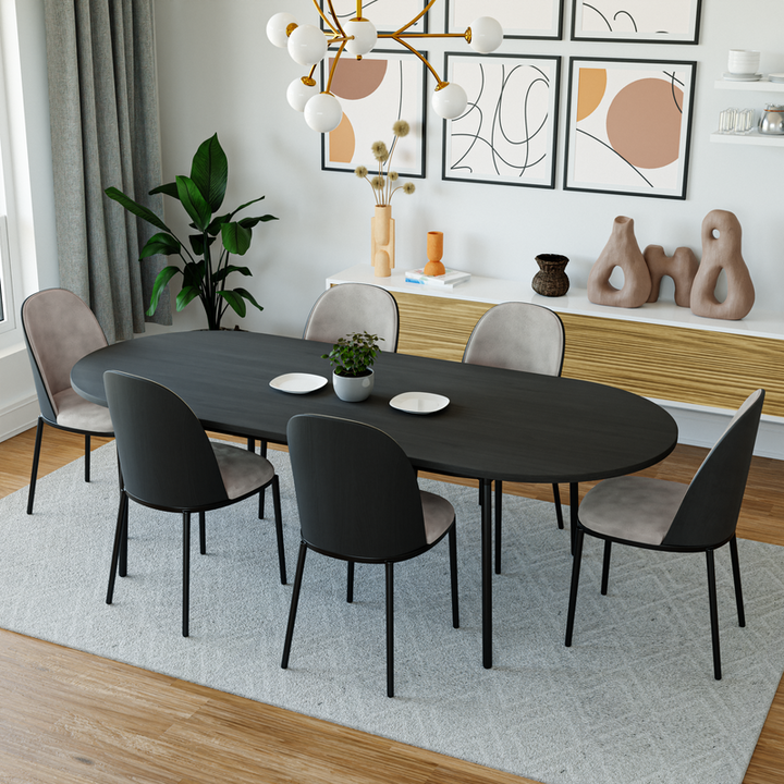 LeisureMod Tule Modern 83" Oval Dining Table with MDF Top and Black Steel Legs in Black in Dining Room.