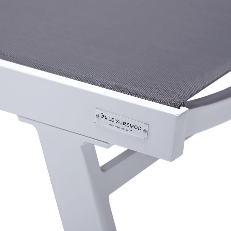 LeisureMod Marlin Patio Chaise Lounge Chair with Armrests in White Aluminum Frame, Set of 2 in Dark Grey Closeup.