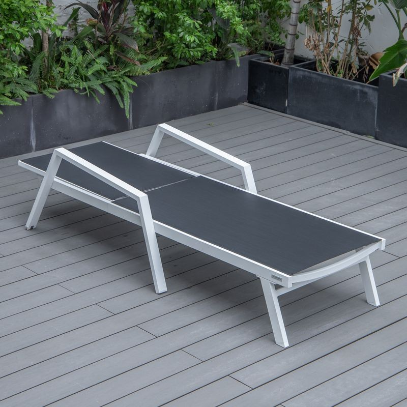 LeisureMod Marlin Patio Chaise Lounge Chair with Armrests in White Aluminum Frame Black Flat View.