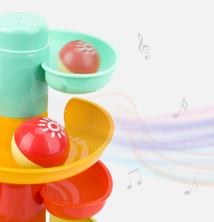 Colorful toy set with musical notes on a light background.