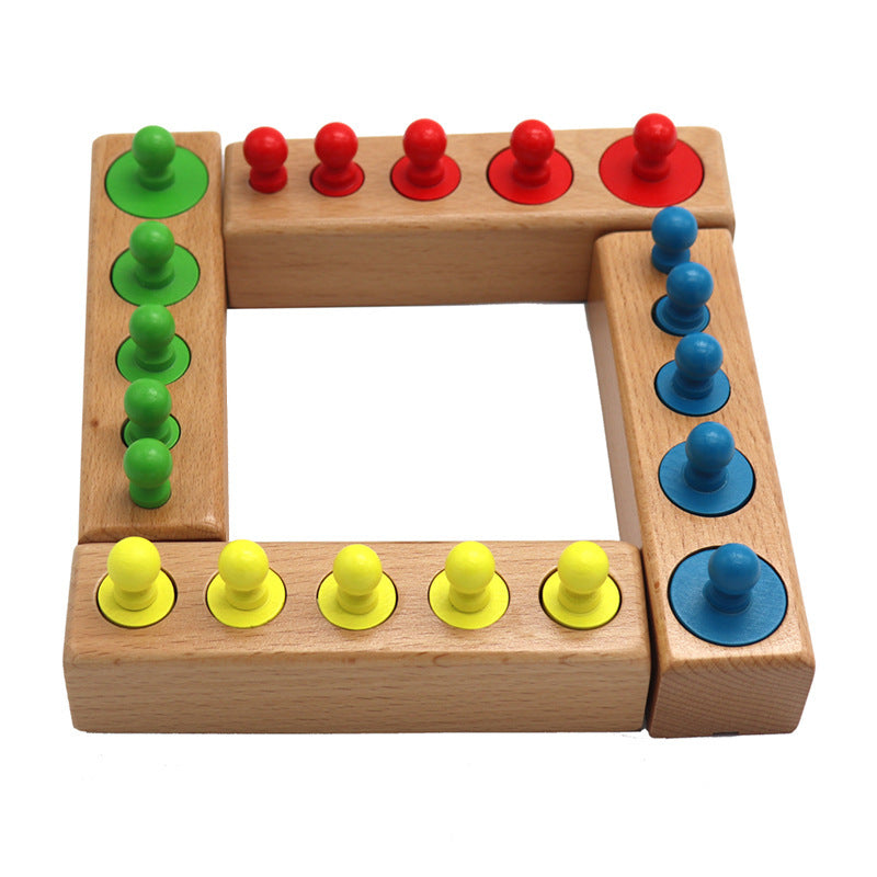 Wooden peg board with colorful pegs on a white background.