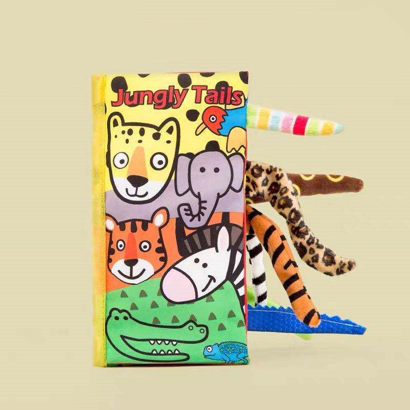 Children's book titled Jungle Tails with animal illustrations and a toy tiger on a beige background.