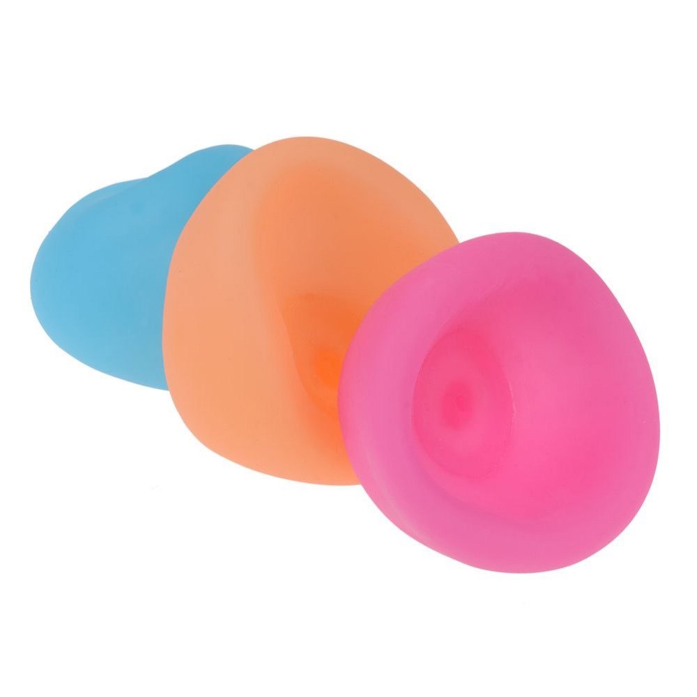 Three colorful silicone cups on a white background.