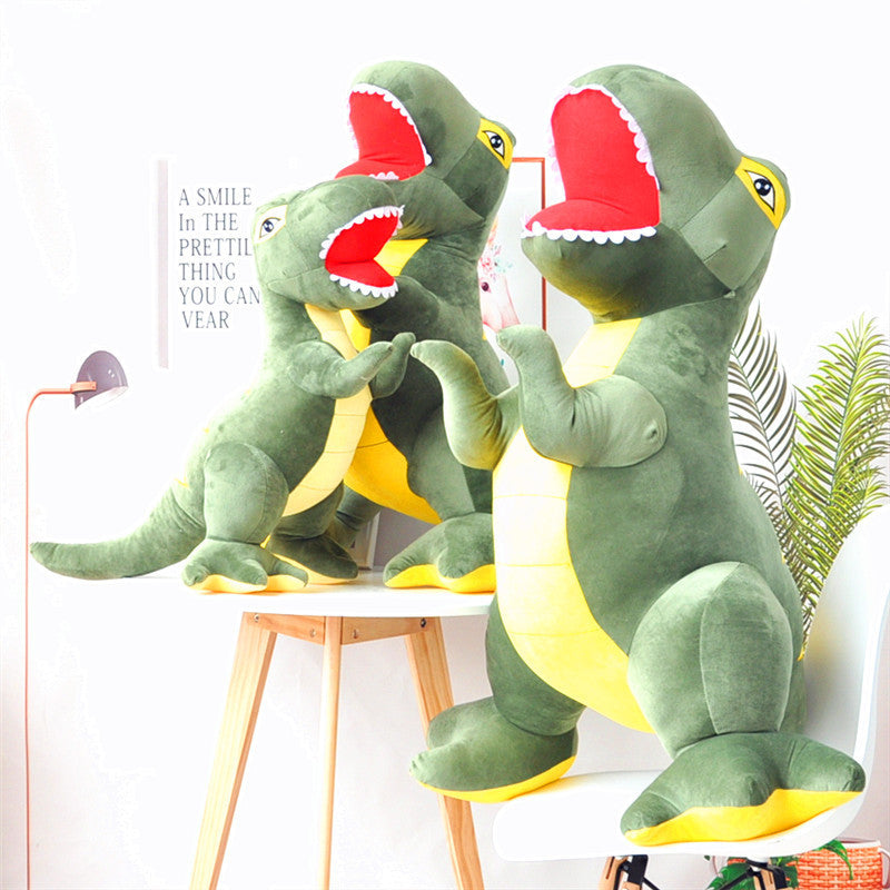 Two green plush toys resembling dinosaurs with red mouths on a white background.