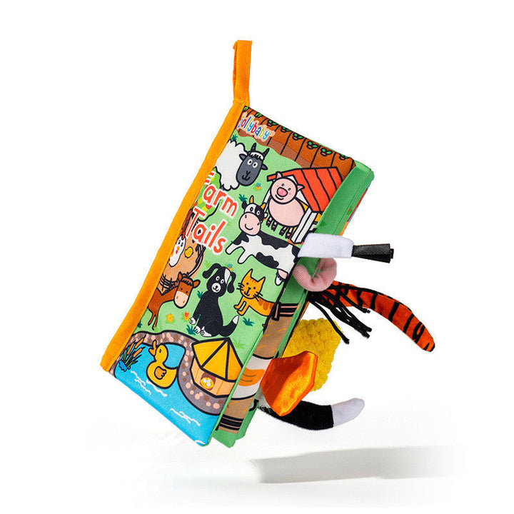 Children's soft book with farm animals on a white background.