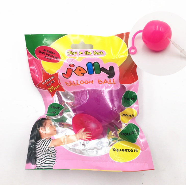 Packaged jelly balloon ball with colorful design on a white background.
