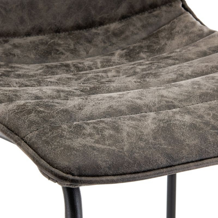 LeisureMod Brooklyn 29.9" Modern Leather Bar Stool with Black Iron Base and Footrest Closeup.