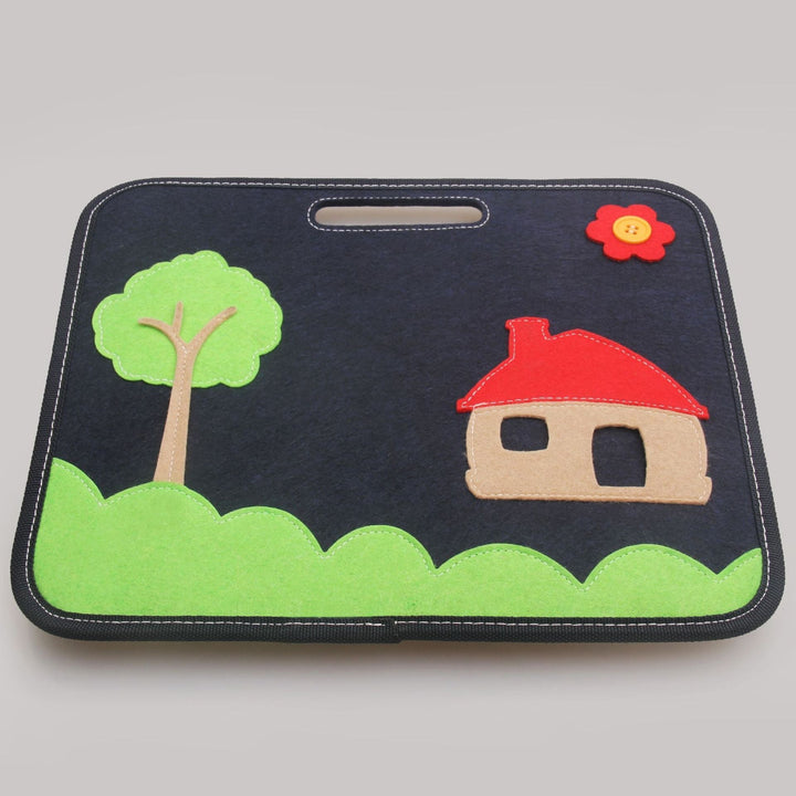 Car seat cover with a house and tree design on a gray background.