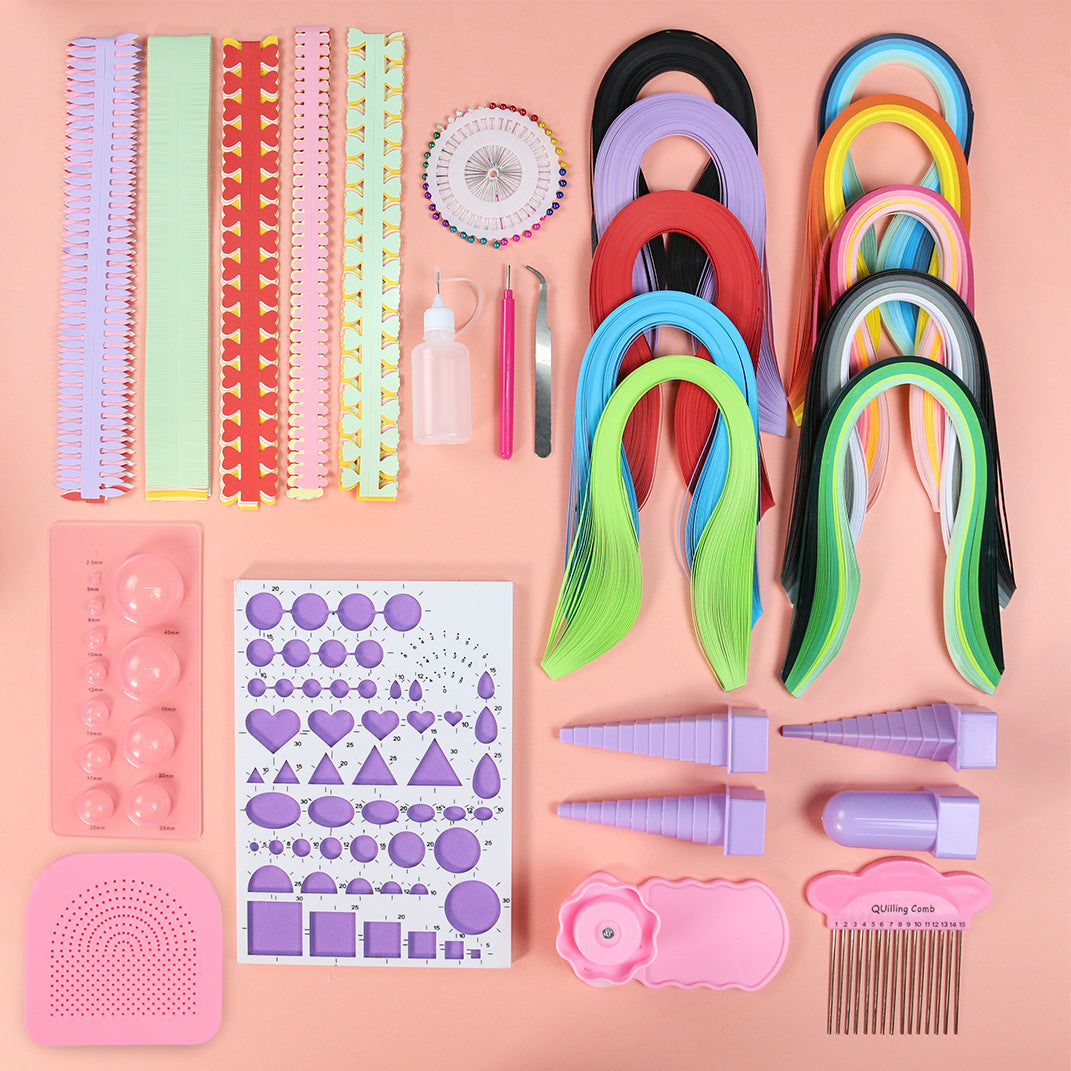 Collection of hair styling tools and accessories on a pink background.