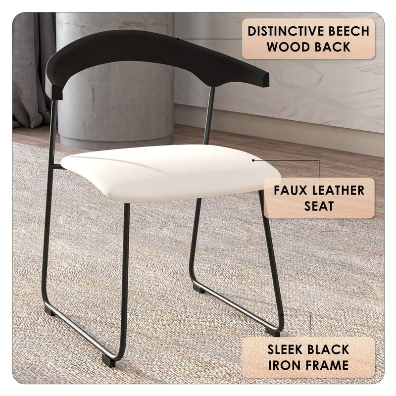 Modern chair with white seat and black frame in a room setting.