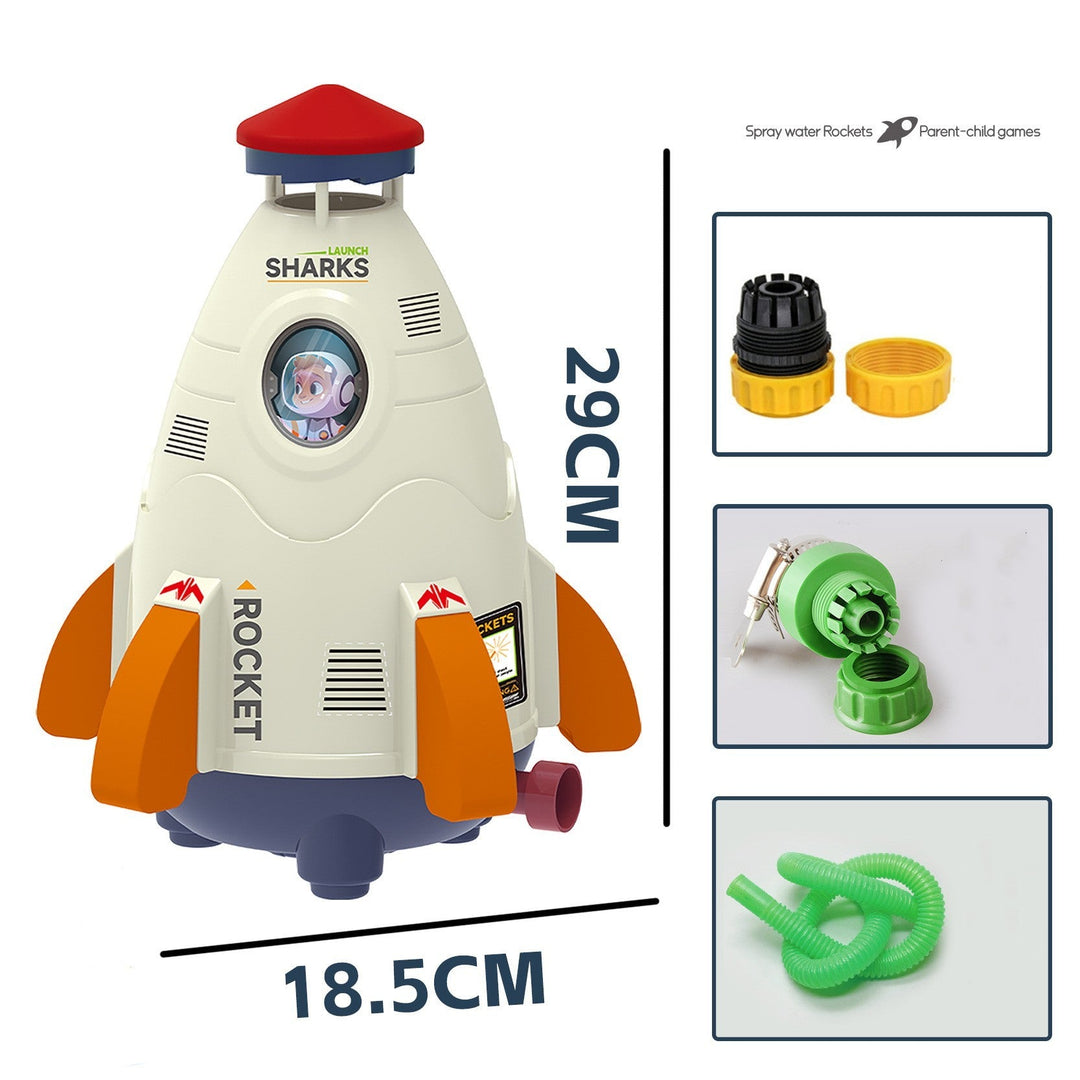 Toy rocket with shark design, measurements, and additional components on a white background.