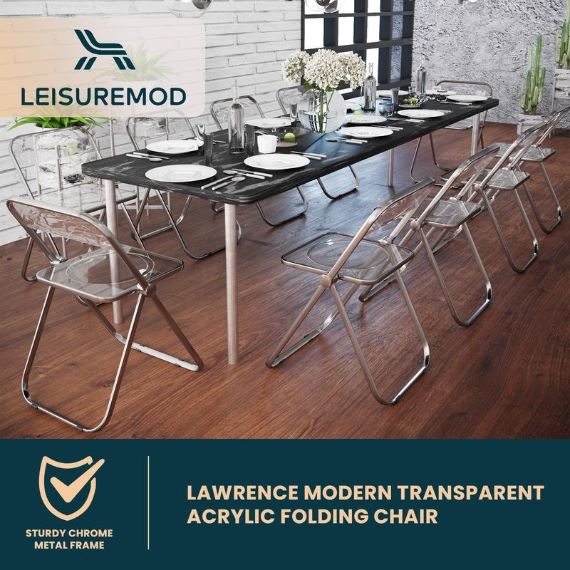 LeisureMod Lawrence Acrylic Folding Chair with Metal Frame at the Table.
