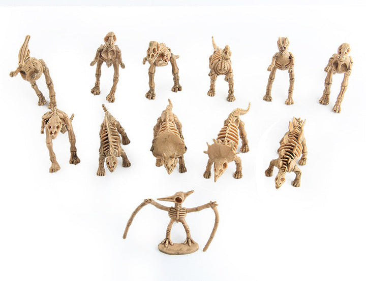Collection of various animal skeleton models on a white background.