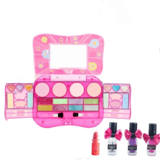 Children's makeup set with pink case, mirrors, and small bottles on a white background.