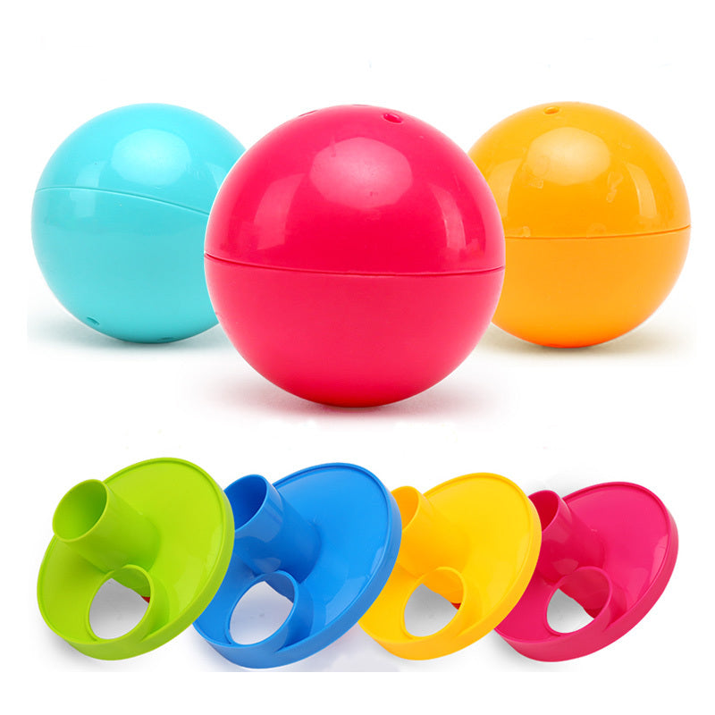 Colorful spherical containers with lids on a white background.
