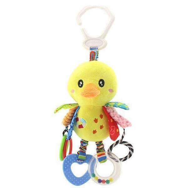Yellow duck plush toy with colorful attachments on a white background.