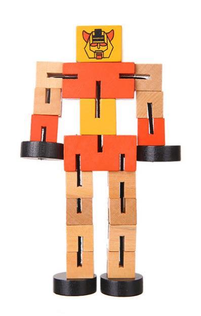 Toy figure made of interlocking wooden blocks with a yellow face on a white background.
