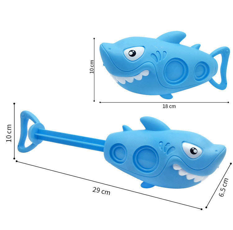 Blue shark-shaped sand shovel with measurements on a white background.