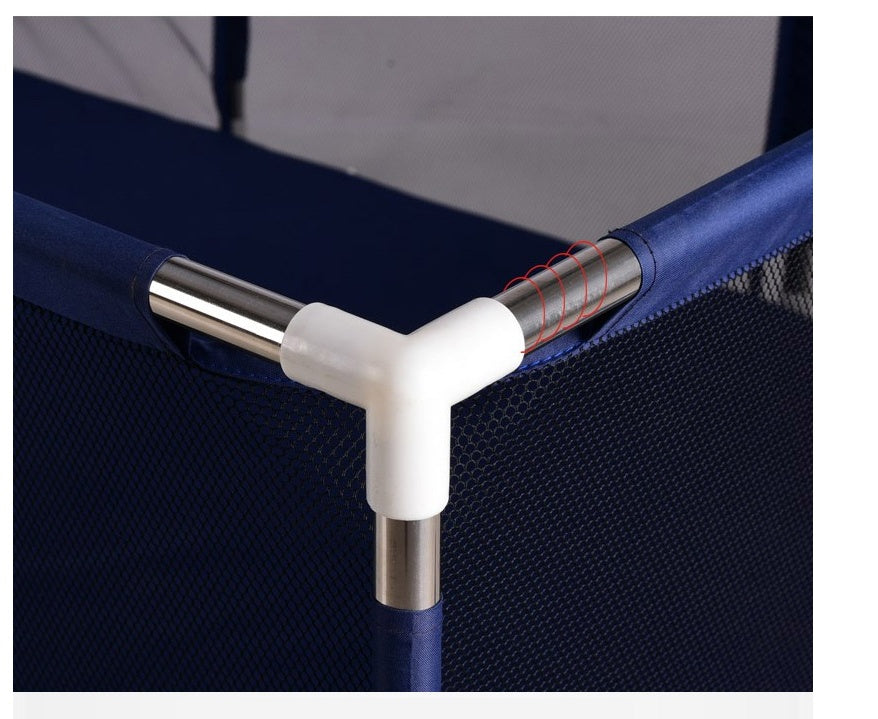 Close-up of a blue mesh framed playpen with a white T-shaped connector on a gray background.