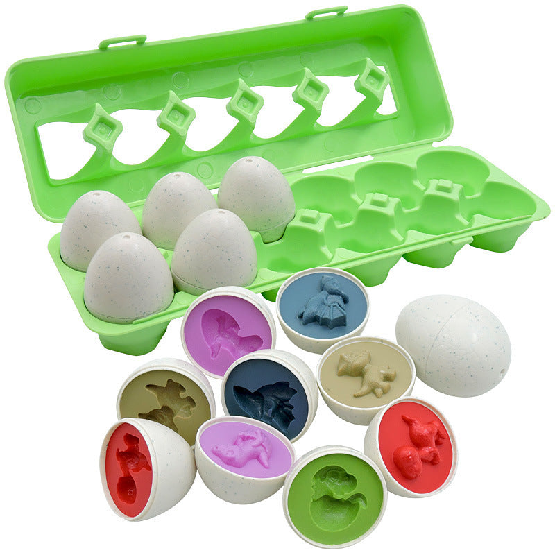 Set of silicone egg molds with various animal shapes in a green carrying case.