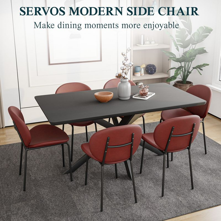 LeisureMod Servos Modern Dining Side Chair with Upholstered Faux Leather Seat and Powder Coated Iron Frame for Kitchen and Dining Room Bordeaux at Table.