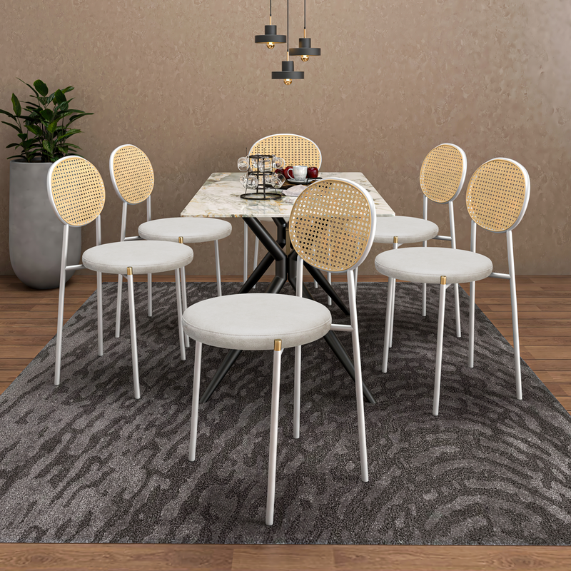 LeisureMod Euston Modern Wicker Dining Chair with White Frame and Leather Seat in White Set of 2 at Table.