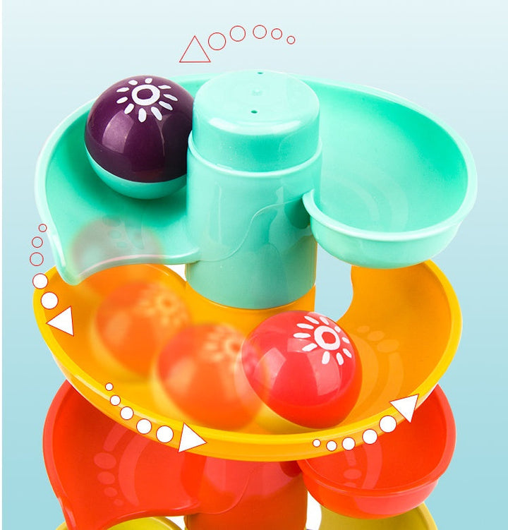 Colorful toy with a spiral design on a light blue background.