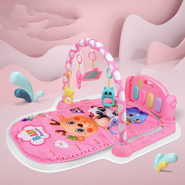 Pink baby play gym with toys on a pink background.