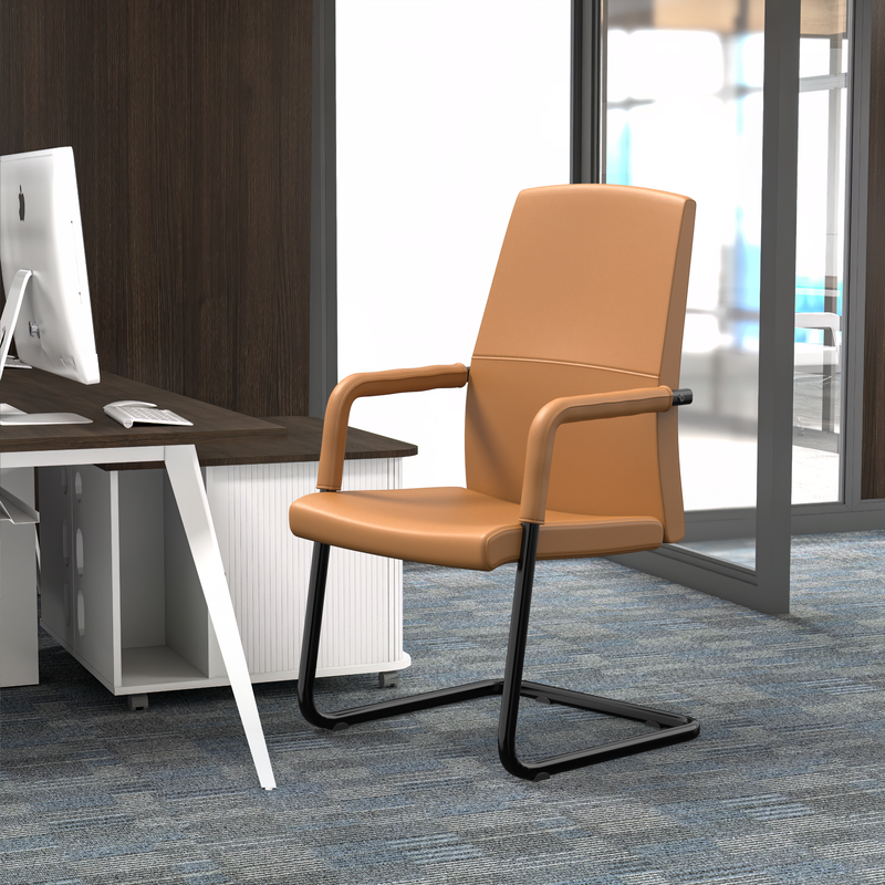 LeisureMod Evander Office Guest Chair in Acorn Brown Leather at Desk.